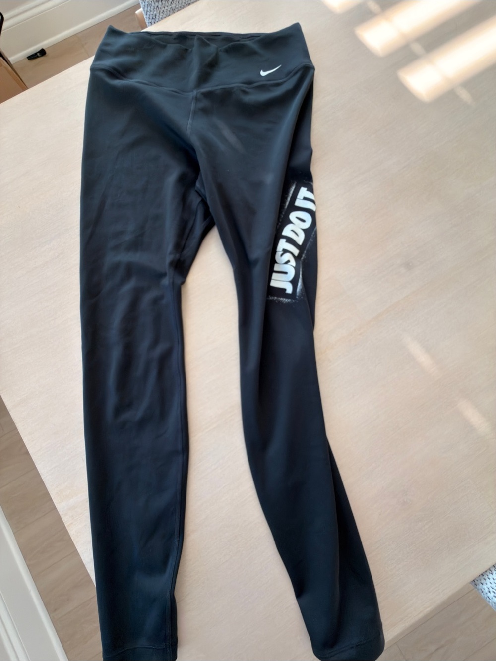 Nike Black Leggings with White 'JUST DO IT' Side Graphic - Size Medium